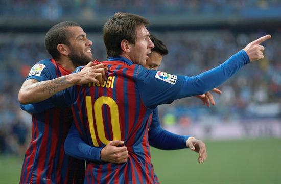 Leo Messi del FC Barcelona celebra un gol ante el Málaga CF. Foto: EFE
