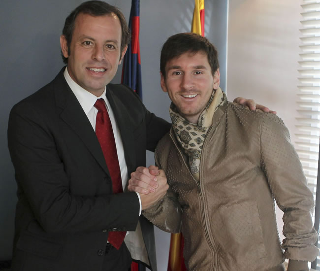 Sandro Rosell,presidente del FC Barcelona y Leo Messi. Foto: EFE