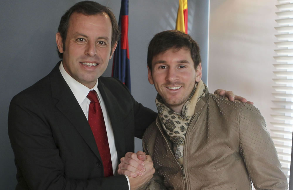 Sandro Rosell, presidente del FC Barcelona y el jugador argentino Leo Messi. Foto: EFE