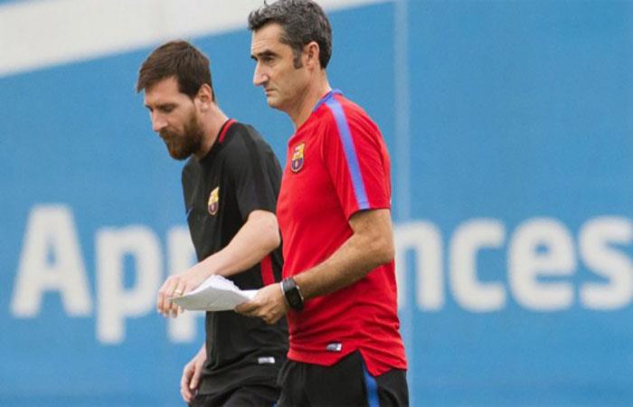 Lionel Messi y Ernesto Valverde. (AFP). Foto: AFP